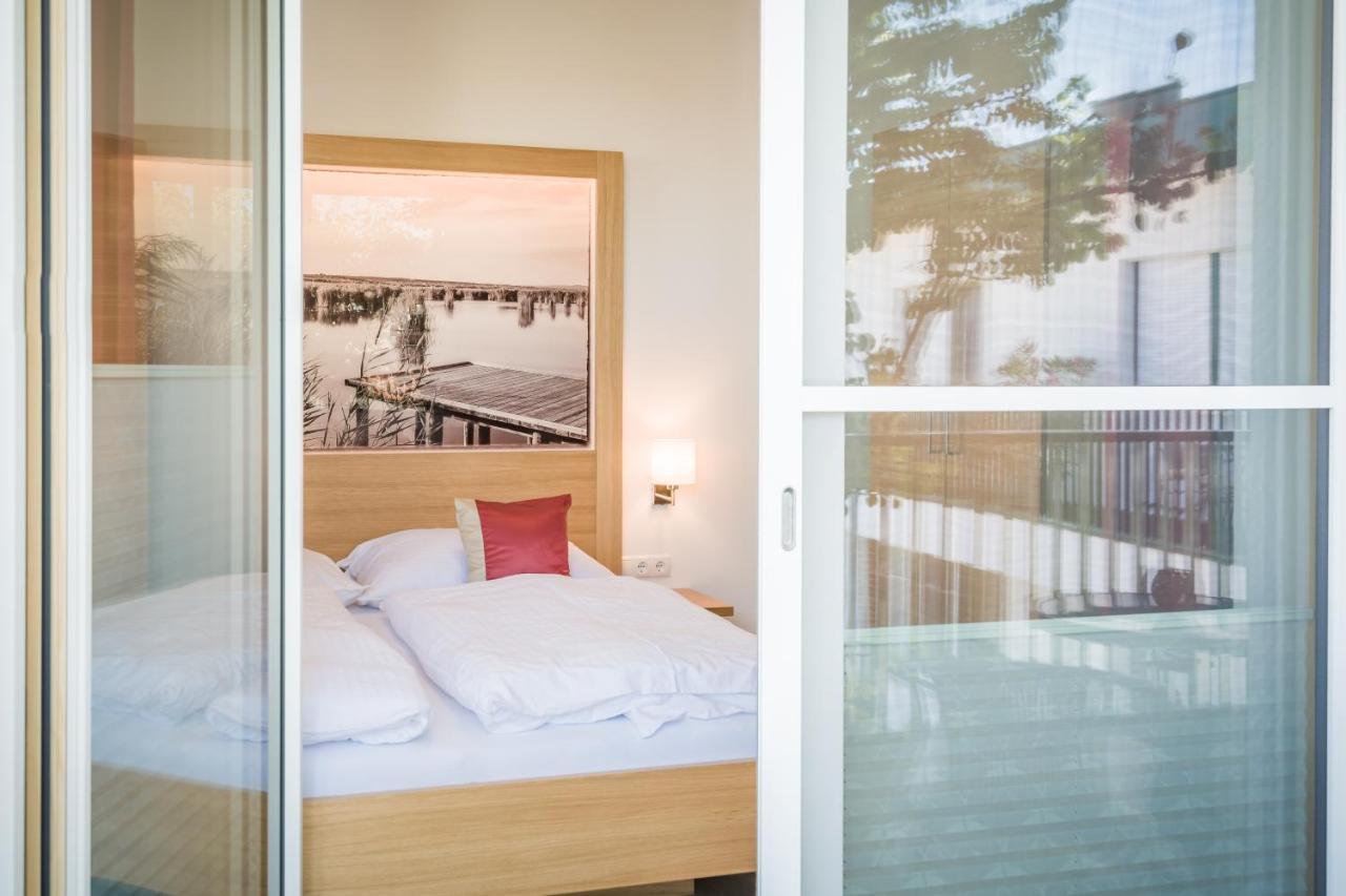 Haus Kranixfeld-Fischl Hotel Morbisch am See Bagian luar foto