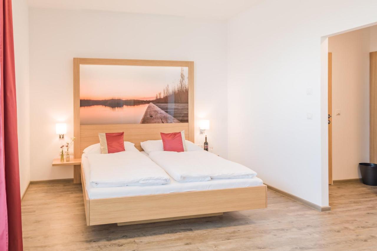 Haus Kranixfeld-Fischl Hotel Morbisch am See Bagian luar foto
