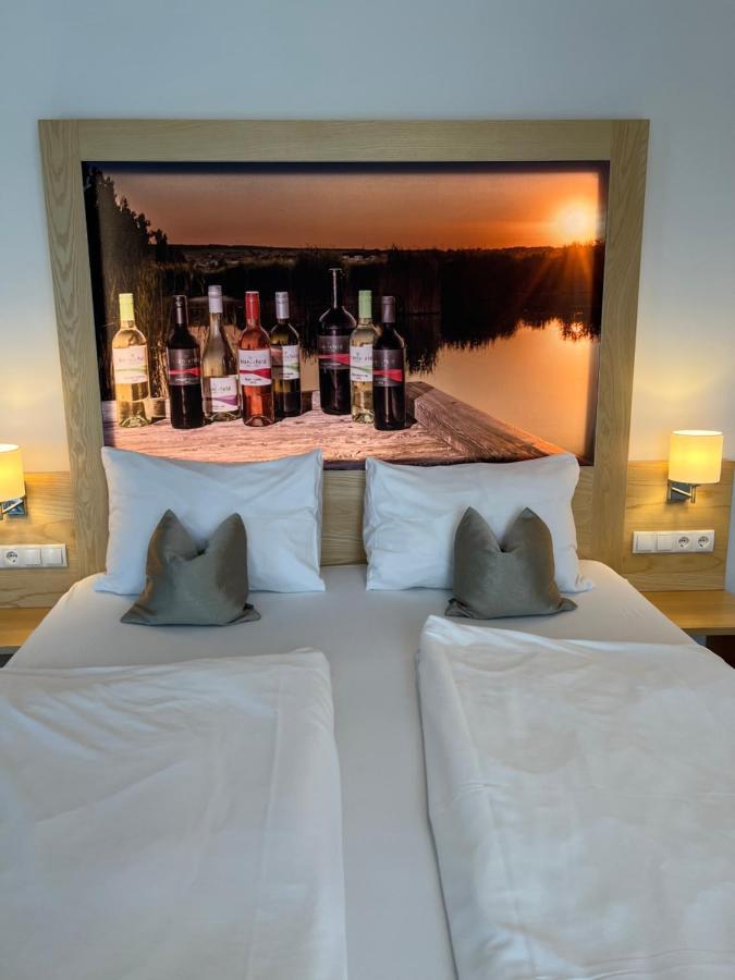 Haus Kranixfeld-Fischl Hotel Morbisch am See Bagian luar foto