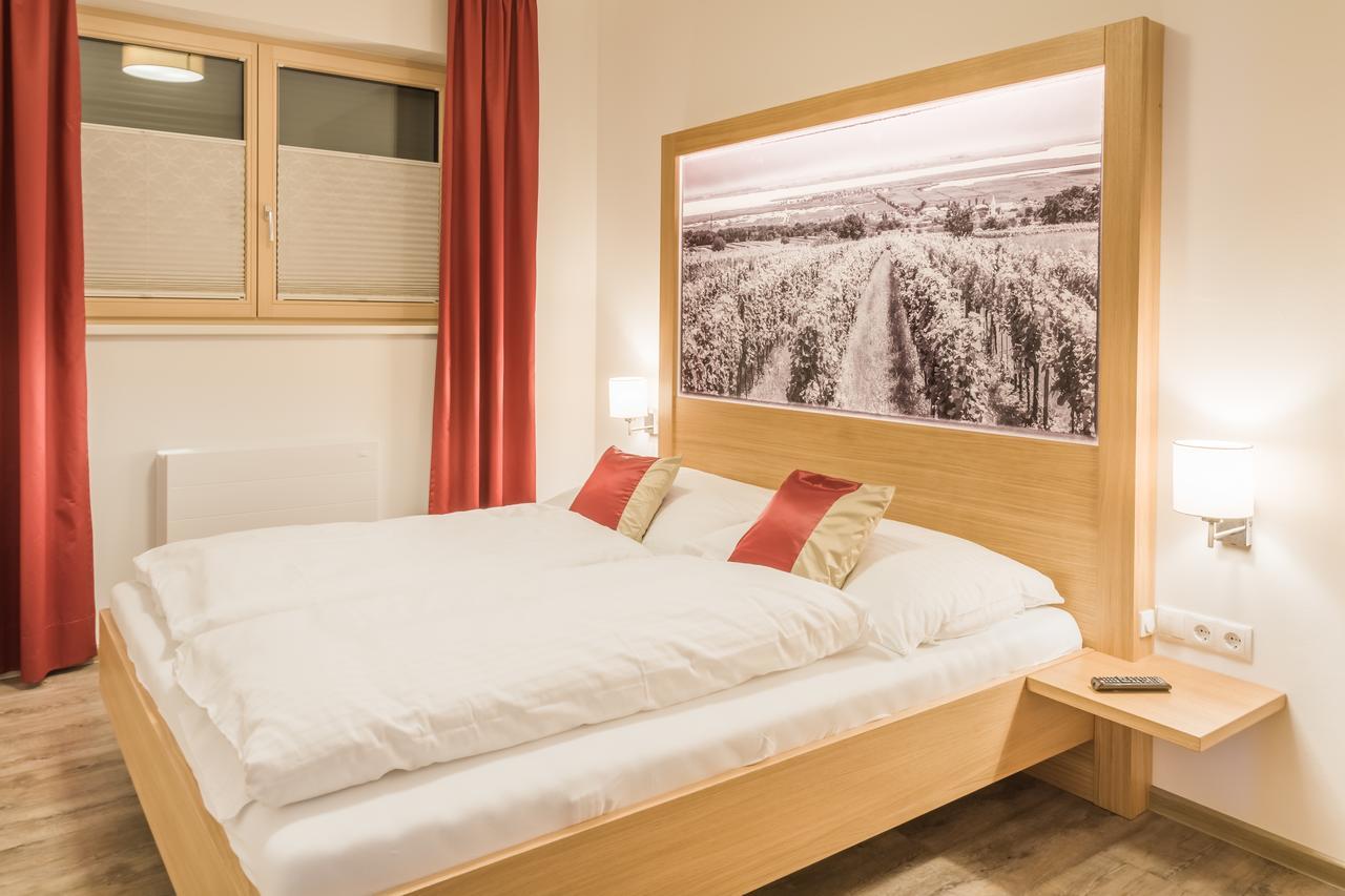 Haus Kranixfeld-Fischl Hotel Morbisch am See Bagian luar foto